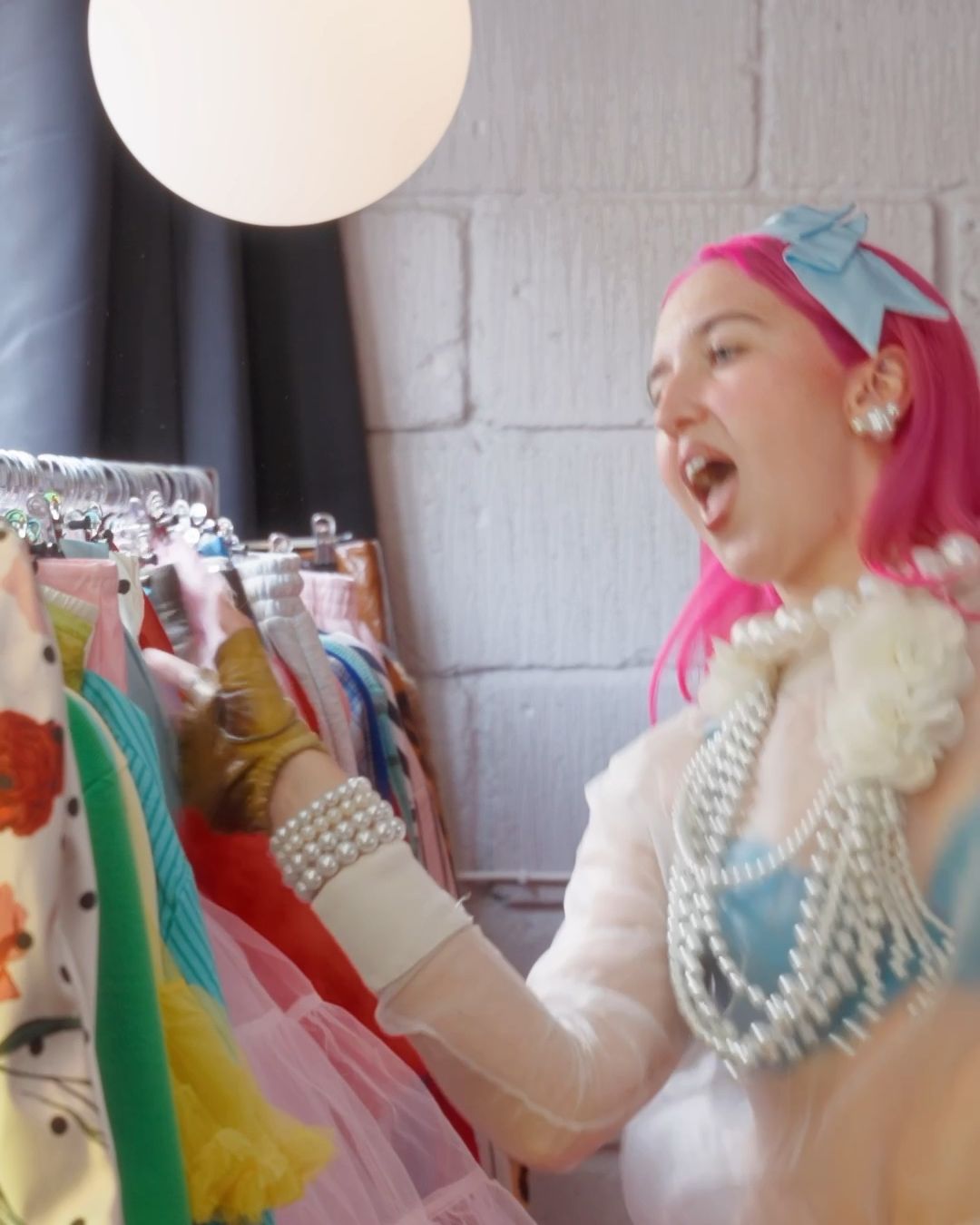 Abigale Masters choosing pieces from the clothes rails