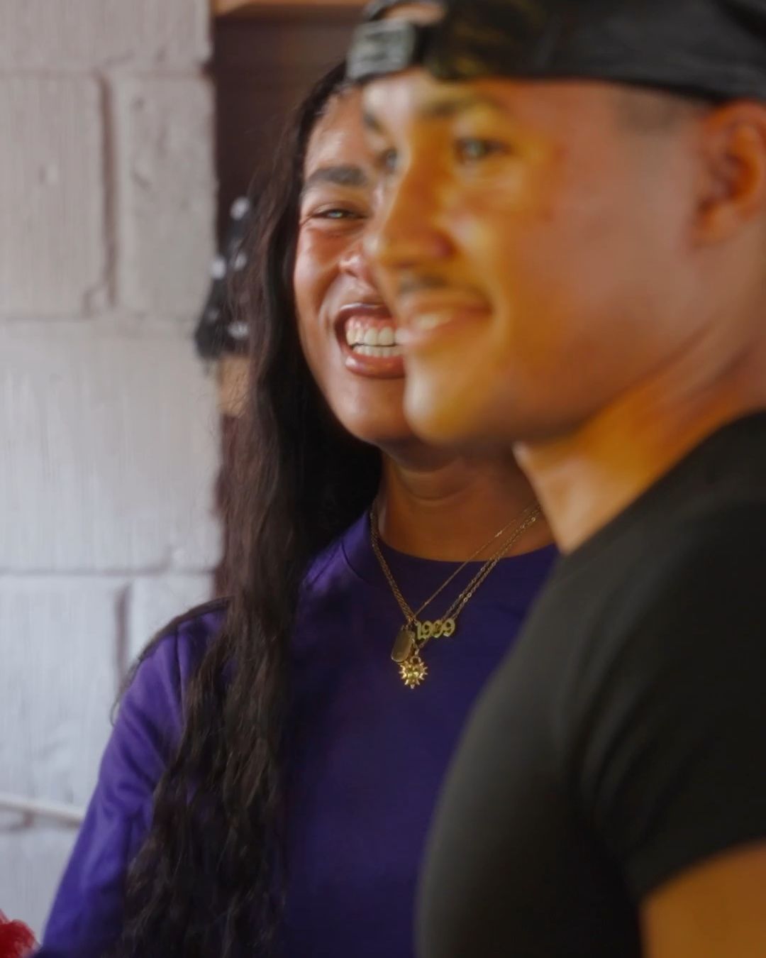Two guests laughing in the salon